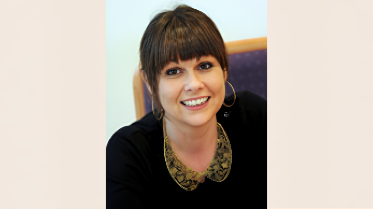 Smiling dark-haired woman